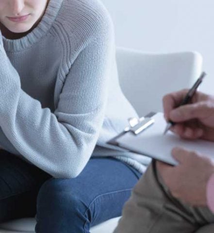 Girl during session with psychotherapist